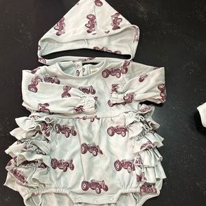 Adorable romper and cap! Only worn once for photos